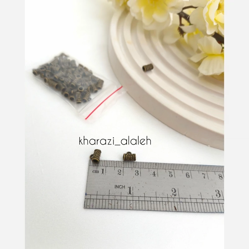 خرجکار آویز طرح استوانه ای  (فروش به صورت بسته 15 گرمی و تعداد تقریباً 49 عدد )