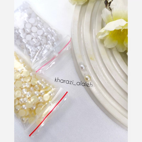 مروارید لپه ای سایز 06 (فروش به صورت بسته 20 گرمی)(سفید حدوداً 330 عدد و شیری حدوداً 280 عدد)