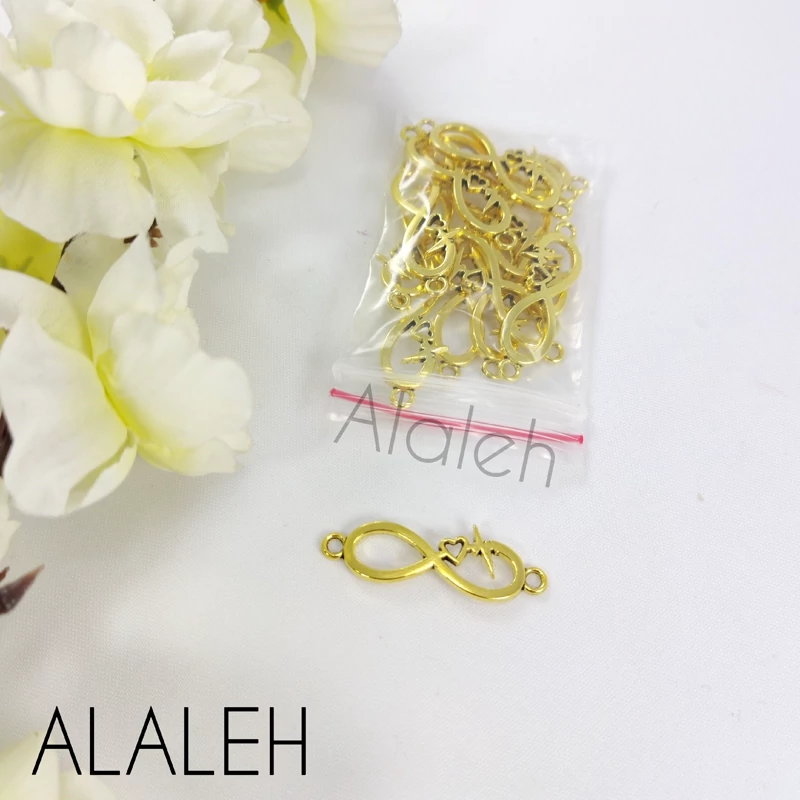 خرجکار پلاک دستبندی طلایی طرح بی نهایت قلبی(فروش به صورت بسته 15 گرمی و تقریباً 14 عددی)