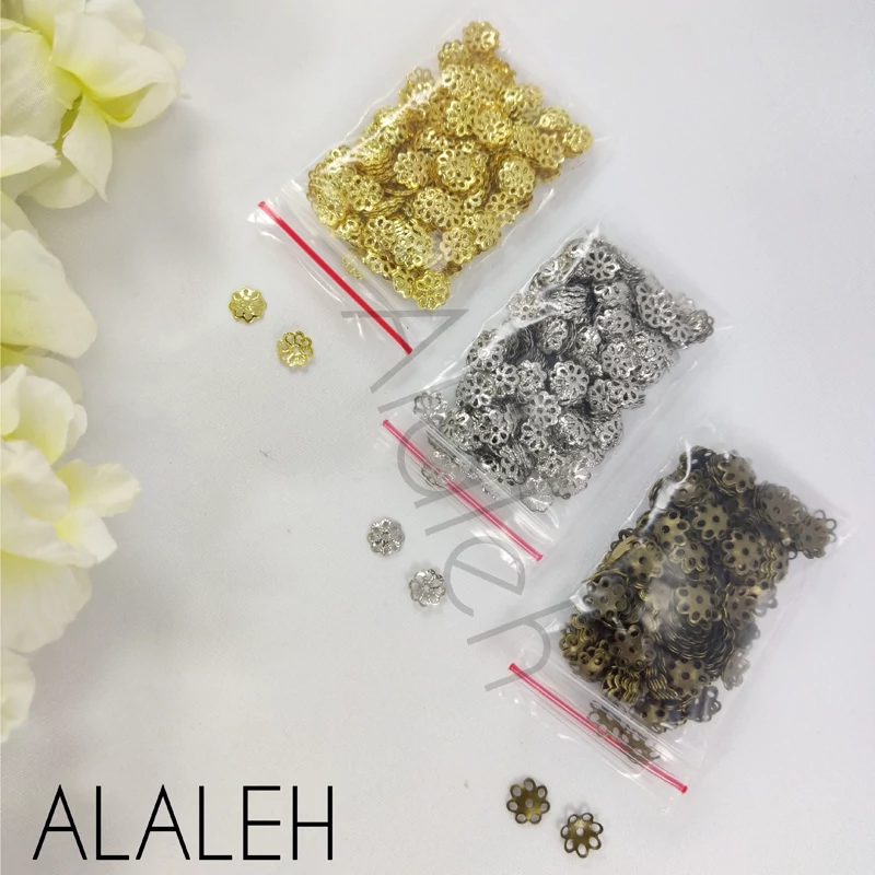 خرجکار کاسبرگ برنزی و طلایی و نقره ای طرح 8 برگ (فروش به صورت بسته 15 گرمی و تقریباً 300 عددی)