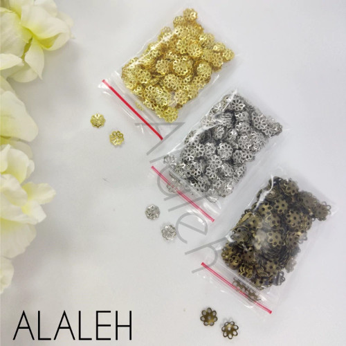 خرجکار کاسبرگ برنزی و طلایی و نقره ای طرح 8 برگ (فروش به صورت بسته 15 گرمی و تقریباً 300 عددی)