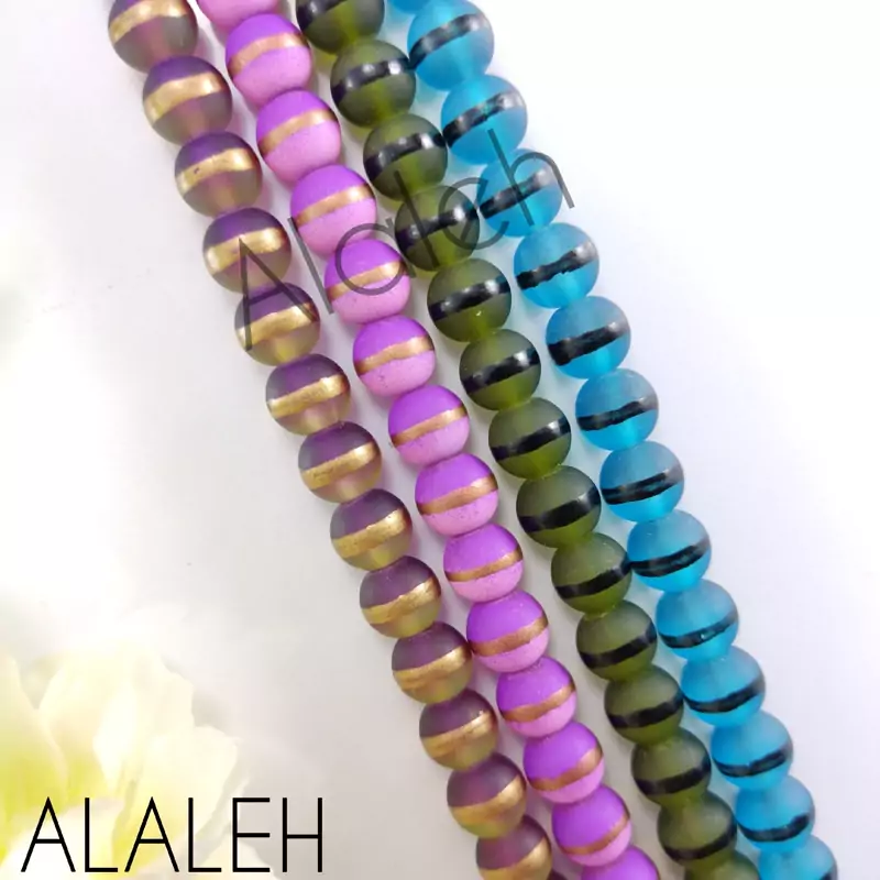 مروارید آبرنگی خط دار(فروش به صورت بندی)(آبی ، سبز و شرابی حدوداً 50 تایی ـــ شرابی حدوداً 42 تایی)