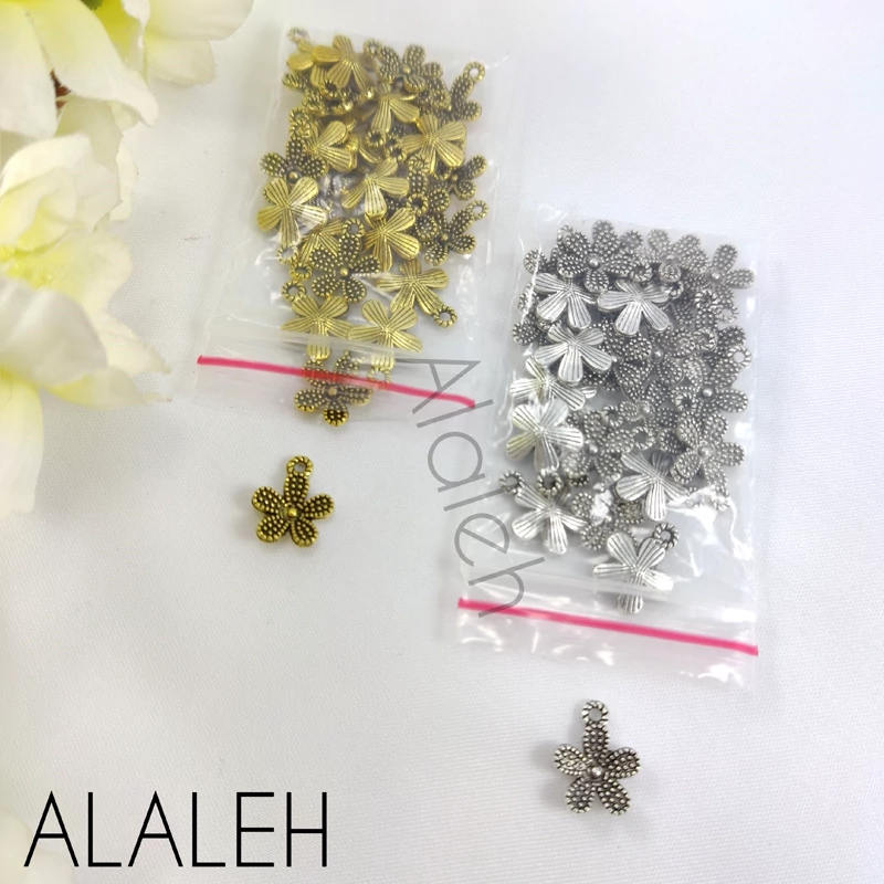 خرجکار آویز طلایی و نقره ای طرح گل شکوفه گیلاس (فروش به صورت بسته 15 گرمی و تقریباً 27 عددی)